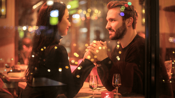 a chinese girl holding hands with a man