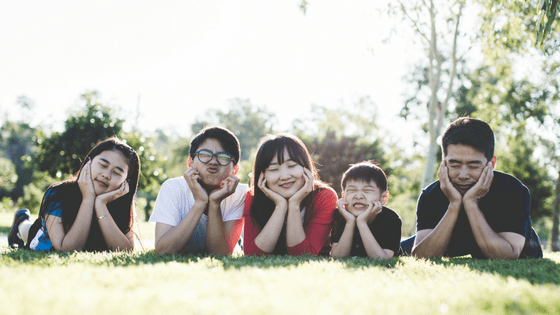 a chinese man with his family