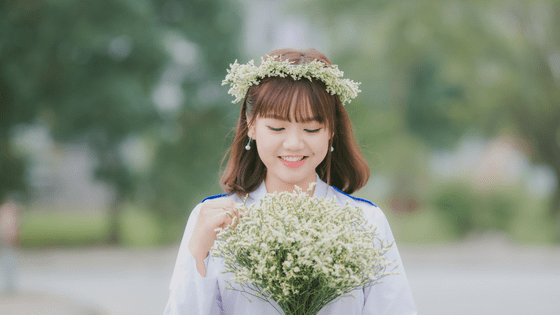 a pretty chinese girl with a flower crown