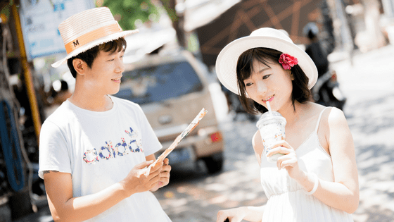 a chinese man being gentleman to his wife