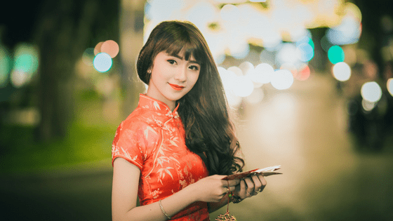 a chinese woman in a traditional dress